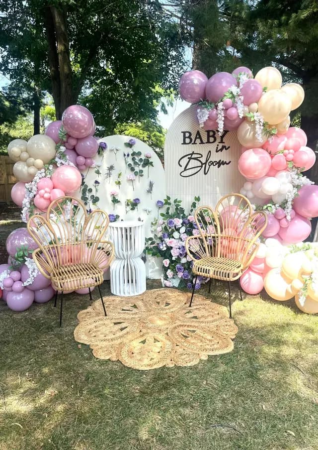 Sage green and pale yellow organic balloon arch